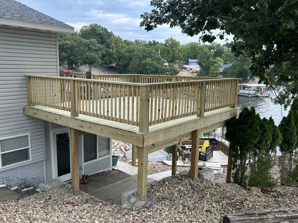 Waterfront elevated deck overlooking water - custom Kansas City deck construction
