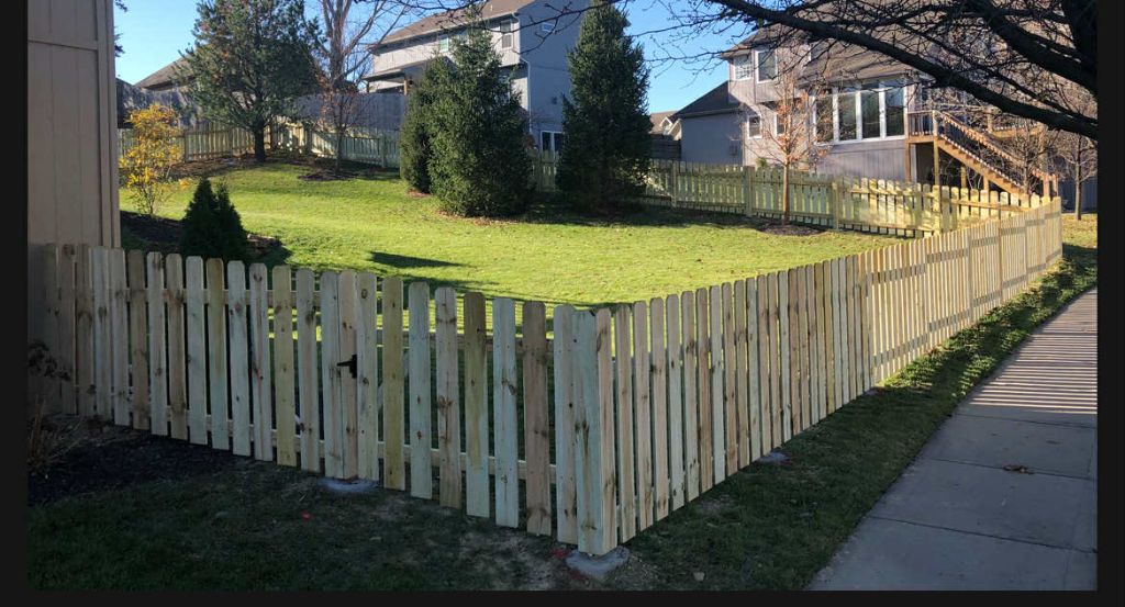 Classic white picket fence by Staunch Properties